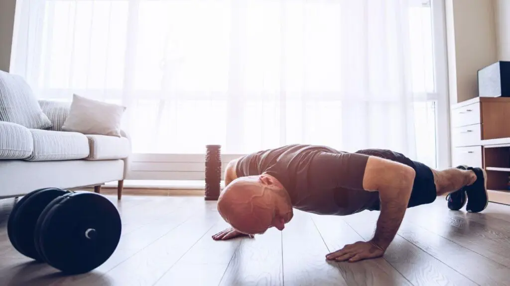 Man does push-ups at home