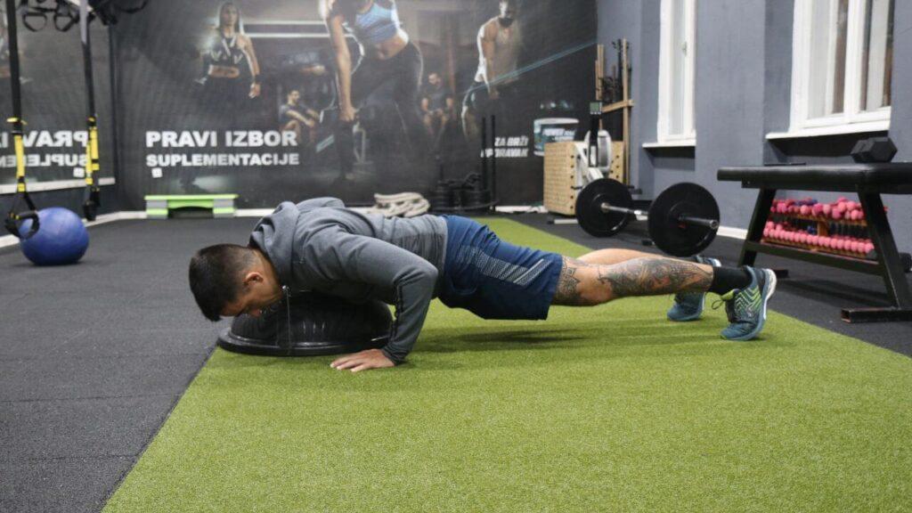 Radomir performs plyometric chest press ups.