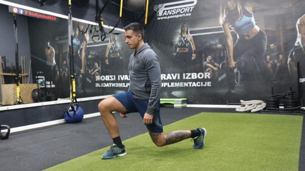 Radomir performs walking lunges