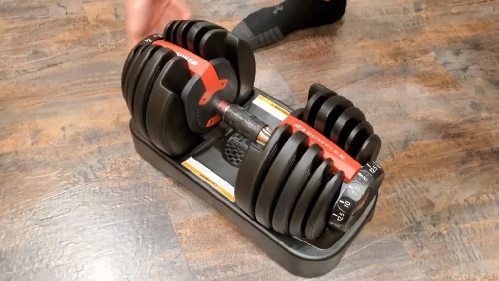 The image shows how to use Bowflex weights.